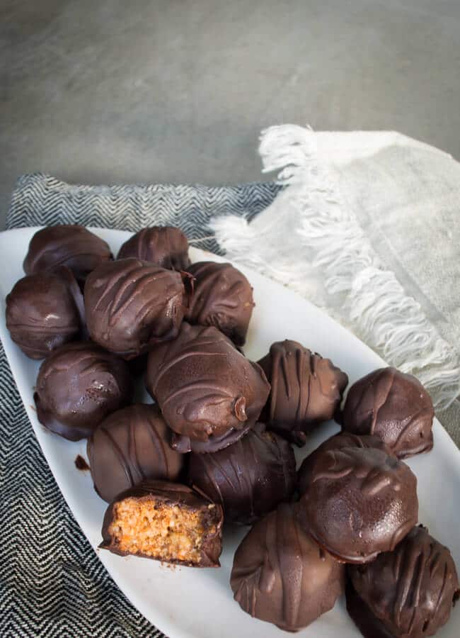 Spiced Carrot Cake Truffles - These Spiced Carrot Cake Chocolate Truffles are a breeze to make and seriously delicious. The blend of spices, orange and chocolate is divine. They are gluten, grain and egg-free with options for dairy and nut-free.