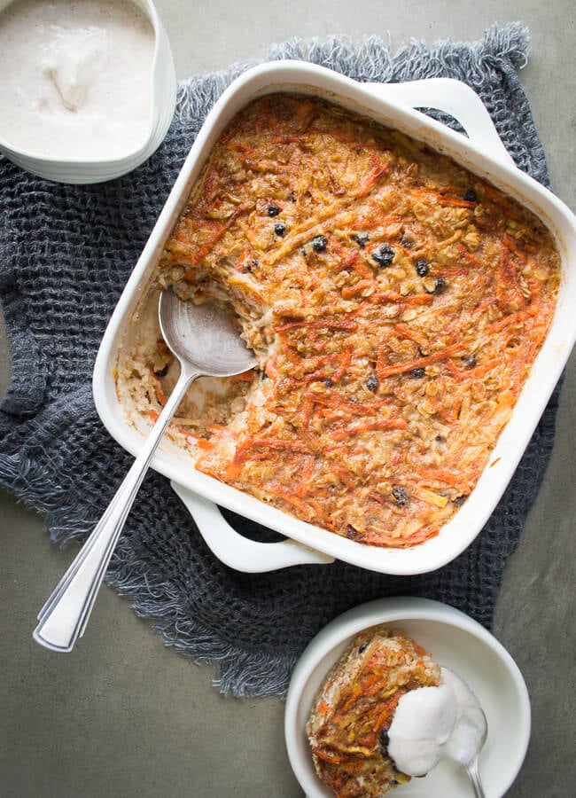 This Carrot Cake Baked Oatmeal (with cinnamon yoghurt) is a easy, super nourishing to make breakfast that includes a serve of both fruit and vegetables.