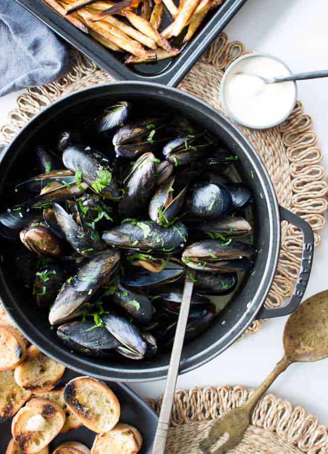 These Creamy Mussels with Garlic Bread are a delicious way to eat mussels and they are super quick and easy to make. Prep to plate in just 30mins.