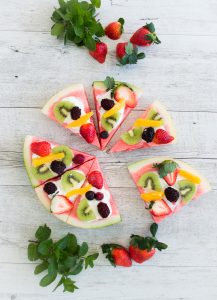 Party food doesn't get easier or more versatile than this Watermelon Pizza! Healthy, simple & fun, kids can also decorate it themselves.