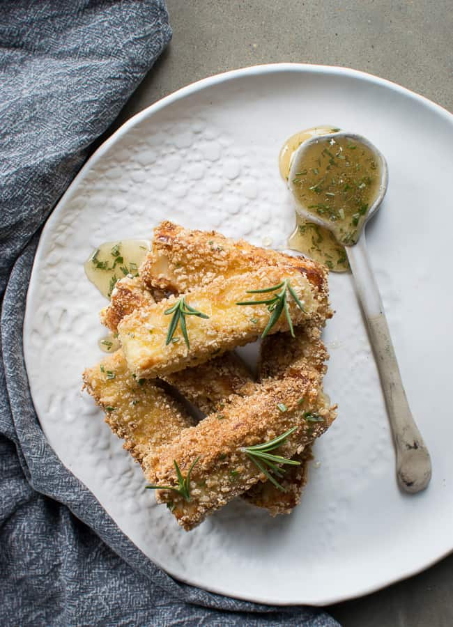 These scrumptious Crispy Haloumi Chips with Lemon, Rosemary Honey are quick and easy to make and a beautiful combination of flavours and textures.