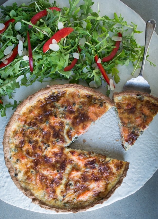 This lemony smoked salmon, spinach and caper quiche is a perfect summer meal. Just as delicious cold, as it is it hot.