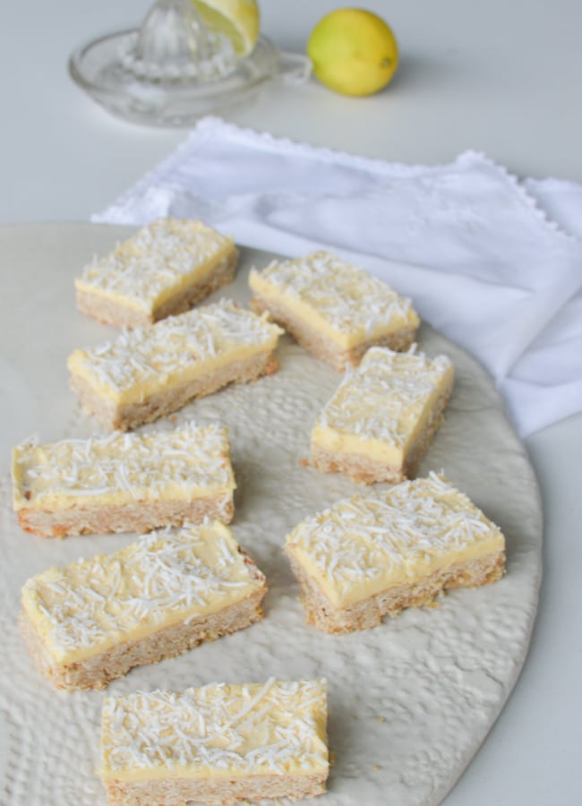 This zest Lemon Coconut Slice is a delicious, very easy to make, low sugar lunchbox treat or snack. Sure to become a favourite.