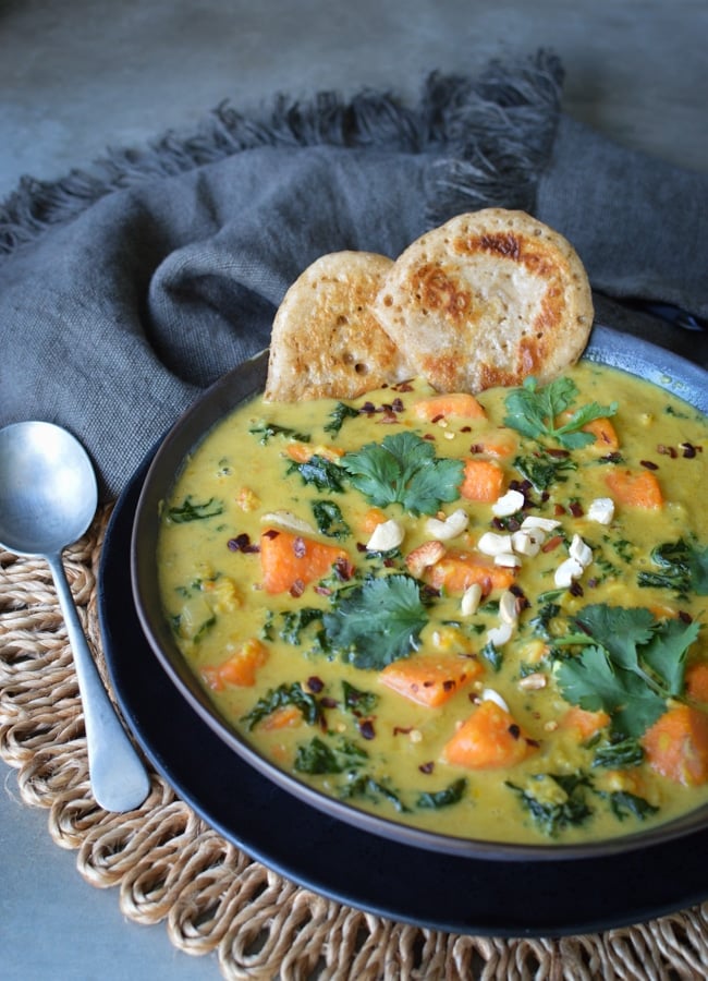 This Creamy Kale Sweet Potato Soup is a deliciously hearty soup that will warm and truly nourish, made from nutritious simple ingredients.