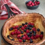 This Spelt Dutch Baby is essentially a big, puffy, delicious family-style pancake baked in a sizzling-hot buttered skillet.