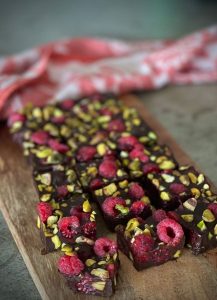This Raspberry Pistachio Rocky Road is made with Well Nourished Raw Chocolate which makes a healthy but decadent base for rocky road.