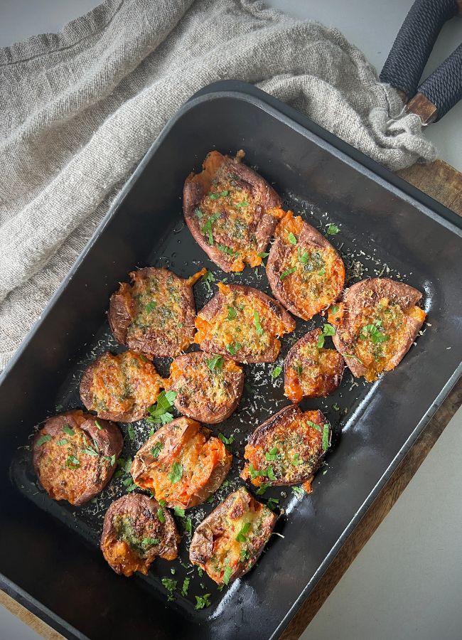 These Smashed Garlic Roast Sweet Potato are a quick and easy to make and are a delicious side or savoury snack.