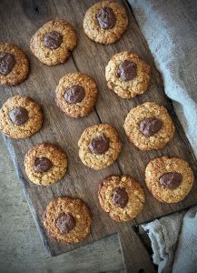 We’ve got quite a few flavour variations on the humble Anzac biscuit here at Well Nourished. This new Hazelnutella Anzac is sure to become an anytime of the year favourite. The combination of oaty anzacs with the hazelnut meal and nutella centre is a match made in heaven.