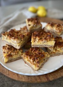 This Anzac Lemon Slice is a delicious way to combine your favourite Anzac cookie and lemon curd flavours to make a nourishing treat.