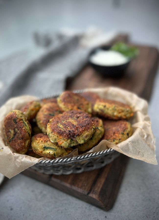 These veggie packed Carrot Zucchini Falafel are a delicious snack or meal that you're going to love. They pair so beautifully with the garlic yoghurt dipping sauce.