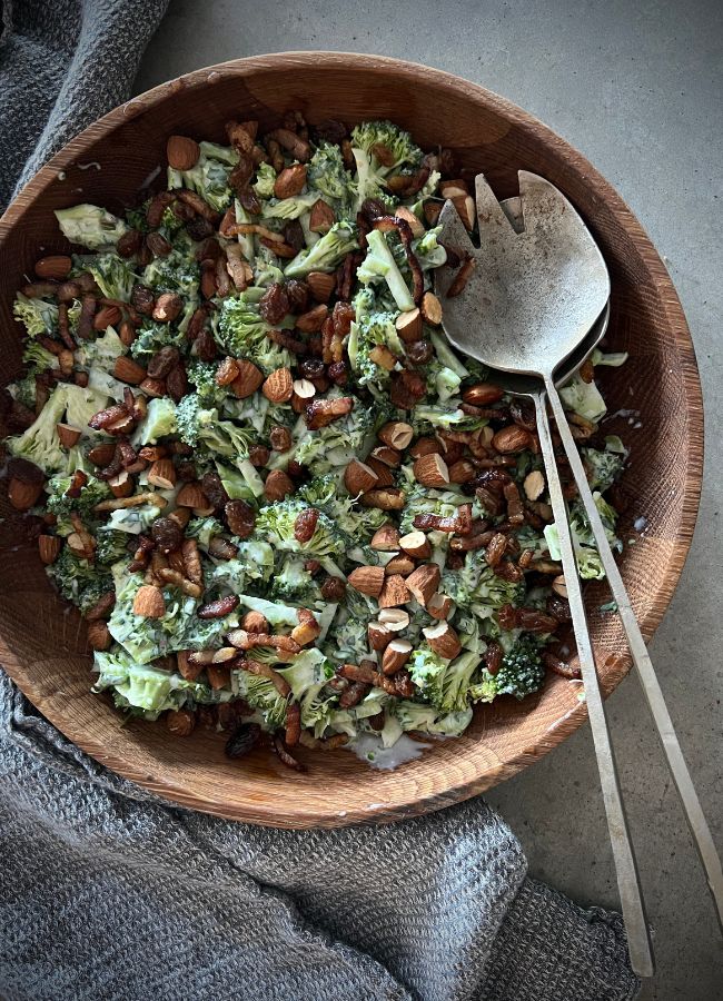This Broccoli Bacon Salad is crunchy and fresh from the raw broccoli while coated with a delicious creamy dressing and crispy pieces of bacon.