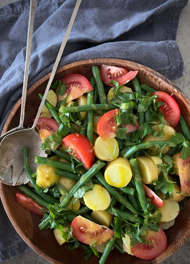 This Greek Bean and Potato Salad is a bright, colourful side that pairs well with any kind of grilled protein.
