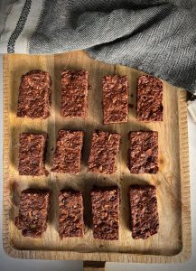 This easy to make, delicious gluten-free Chocolate Muesli Slice is going to become your new favourite. It’s got a lovely almost cornflake like crunch and it freezes perfectly for fast lunchbox packing.