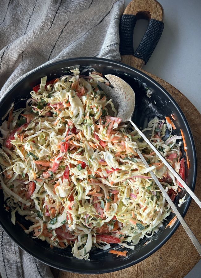 This Creamy Coleslaw has a colourful rainbow of vegetables, digestive support from the yoghurt and loads of flavour with the delicious dressing that includes honey, mustard and lemon juice.