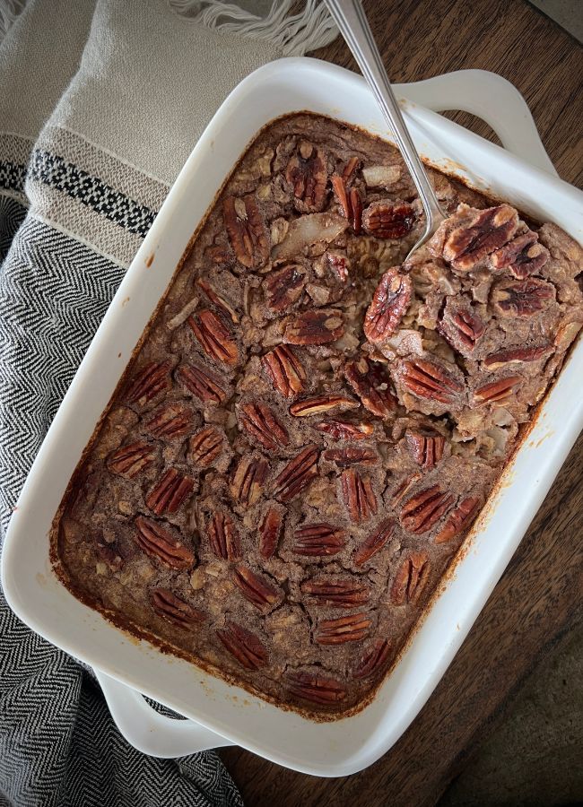 This Pecan Pie Baked Oatmeal is a perfect warming, protein rich breakfast for cold mornings. This oatmeal can be baked fresh or if you are short on time you can make the night before and reheat in the morning.