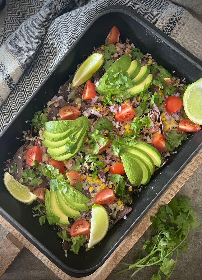 These Quick Tuna Nachos are a perfect pantry meal, an excellent go-to when I'm needing an easy, quick meal. I love the crunch of corn chips and the bursts of juicy corn, flakes of tuna, melty cheese and everything else. This is also a great build-your-own-bowl - keep the salad separate and everyone can add their own favourites.