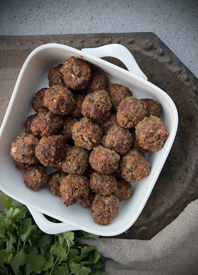 Whip up these beef and vegetable meatballs for a healthy, family-friendly meal. Packed with hidden veggies and served with a rich tomato sauce.