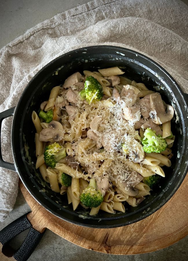 This Creamy Chicken Mushroom Penne dish is a quick and easy one-pot dinner. Chicken thighs are cooked and set aside while a delicious creamy sauce of onions, garlic, wine, mushrooms cooks the penne.