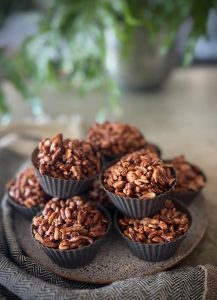 These Healthy chocolate crackles are a delicious treat made with cacao, coconut oil & puffed whole grains. A nutritious take on a classic!
