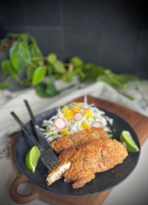 These golden, crispy Chicken Schnitzels (gluten-free) are easy to make with an almond meal crumb. A delicious, family-friendly dinner idea.