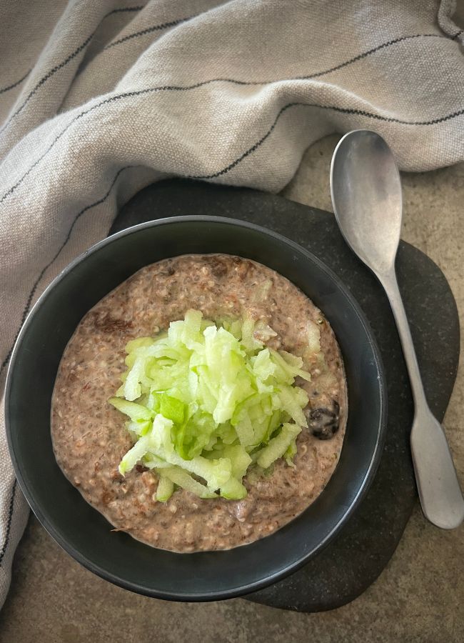 This grain-free Bircher muesli is rich in protein, fibre, sweetened with prunes, making it a meal that supports gut health & digestion.