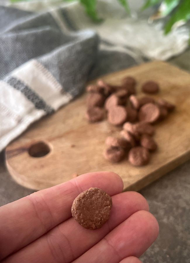 Soothe a sore throat naturally with these easy homemade slippery elm and honey lozenges, featuring healing herbs and essential peppermint oil.