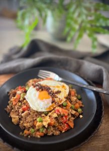 This quinoa fried rice recipe is a healthy twist on classic fried rice. Quick, easy and perfect for a nutritious weeknight meal or meal prep.