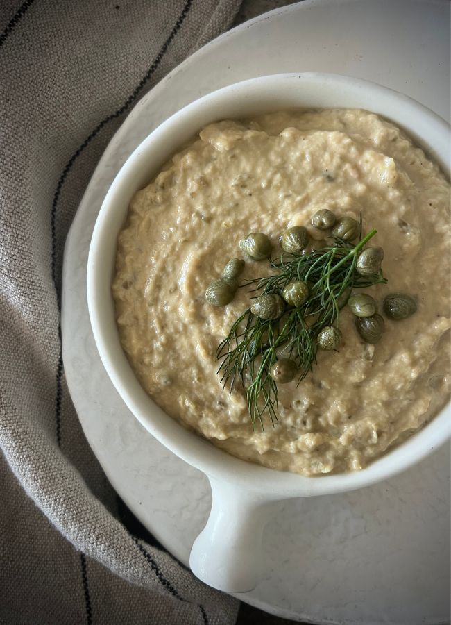 This creamy tonnato sauce combines tuna, anchovies, capers & lemon into a delicious condiment, perfect for salads, veggies or grilled meats.