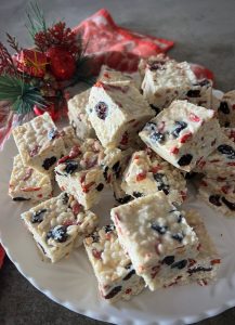 This healthier White Christmas slice combines white chocolate, puffed rice, almonds and dried berries for a festive, delicious sweet treat.
