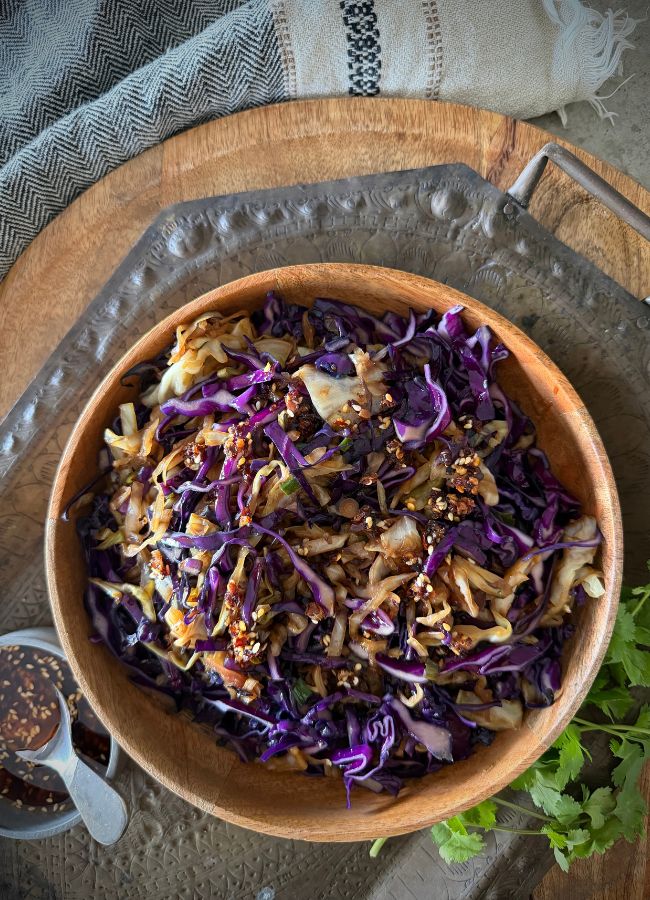 A quick, flavourful Asian cabbage stir-fry made with simple whole food ingredients. A nourishing side dish ready in minutes and easy to adapt.