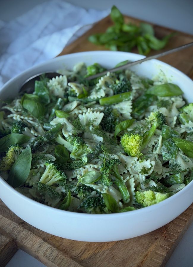 A fresh, herb-loaded summer pasta salad made with blanched greens & yoghurt for a light, creamy dressing. Perfect as a side or easy lunch.