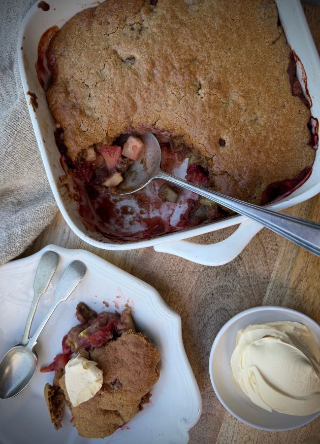 Apple strawberry cobbler with a golden spelt topping. A simple, whole food dessert made with seasonal fruit, cinnamon and nourishing ingredients.