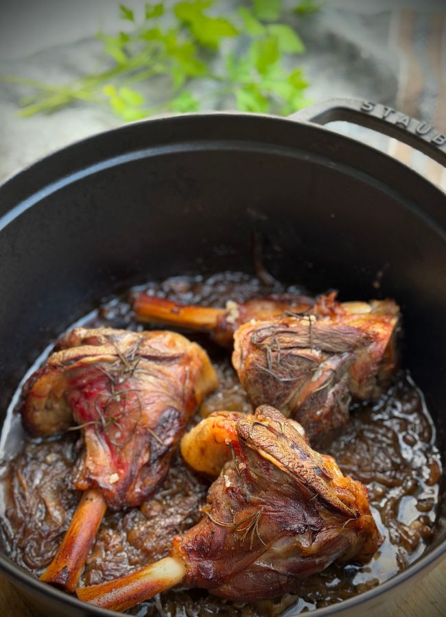 Roasted lamb shanks with caramelised onion, garlic & rosemary is a hearty, healthy slow-cooked meal packed with rich flavour & tender meat.